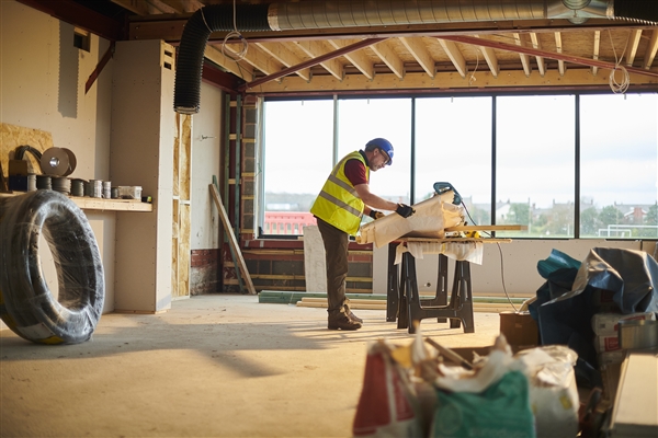 image of contractor in unfinished building