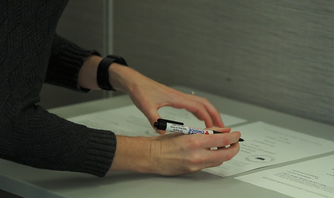 Hand signing election certification papers